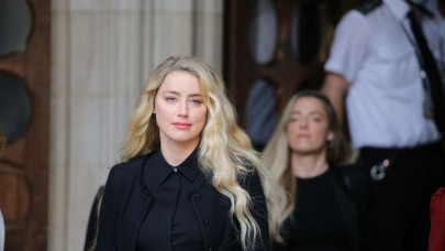 wrong person sat in jury amber heard wants a new trial