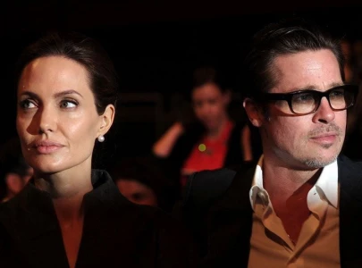 angelina jolie stays silent on brad pitt amidst ongoing divorce