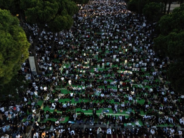 A drone view shows Albanian Muslims attending morning prayers during Eidul Azha celebrations at the main boulevard, in Tirana, Albania, on May 27, 2026. PHOTO: REUTERS