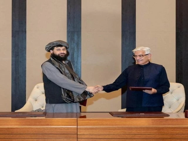 defence minister khawaja muhammad asif and afghan defence minister mullah mohammad yaqoob mujahid shake hands following the signing of a ceasefire agreement mediated by qatar and turkey in doha on october 19 photo reuters defence minister khawaja muhammad asif and afghan defence minister mullah mohammad yaqoob mujahid shake hands following the signing of a ceasefire agreement mediated by qatar and turkey in doha on october 19 photo reuters