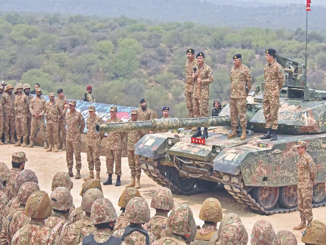 army chief general syed asim munir speaks with troops while standing on a tank at the tilla field firing ranges in jhelum photo afp army chief general syed asim munir speaks with troops while standing on a tank at the tilla field firing ranges in jhelum photo afp