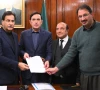 national assembly speaker ayaz sadiq hands over the notification formally appointing mahmood khan achakzai as leader of the opposition to pti chairman barrister gohar ali khan on friday photo x