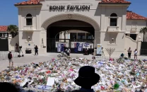 australia charges alleged bondi beach gunman with murder terrorism