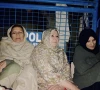 sisters of pti founder imran khan sit outside adiala jail after a meeting was denied on tuesday photo x pti