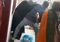 screengrab from a video showing a man brutally assaulting a domestic worker in karachi s buffer zone