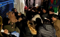 imran khan s sisters stage sit in outside adiala jail after being denied meeting again
