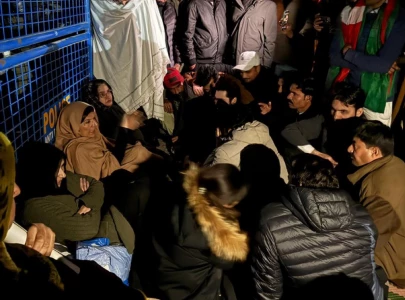 imran khan s sisters stage sit in outside adiala jail after being denied meeting again