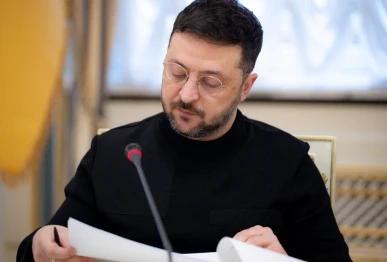 this handout photograph taken on december 23 2025 and released by the ukrainian presidential office on december 24 2025 shows ukraine s president volodymyr zelensky during a meeting with journalists in kyiv photo afp