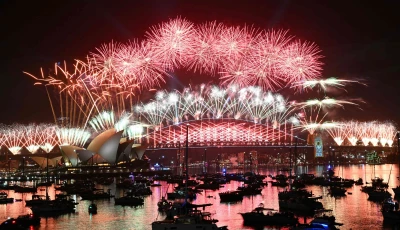 fireworks light up the midnight sky over sydney harbour bridge and sydney opera house during new year s day celebrations in sydney on january 1 2026 photo afp fireworks light up the midnight sky over sydney harbour bridge and sydney opera house during new year s day celebrations in sydney on january 1 2026 photo afp