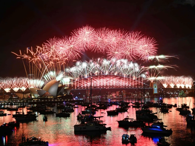 fireworks light up the midnight sky over sydney harbour bridge and sydney opera house during new year s day celebrations in sydney on january 1 2026 photo afp fireworks light up the midnight sky over sydney harbour bridge and sydney opera house during new year s day celebrations in sydney on january 1 2026 photo afp