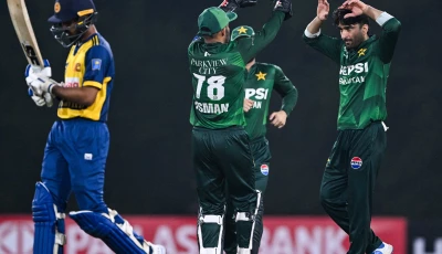 pakistan s salman mirza r celebrates with teammates after taking the wicket of sri lanka s kamil mishara l during the first twenty20 international cricket match between sri lanka and pakistan at the rangiri dambulla international stadium in dambulla on january 7 2026 photo afp