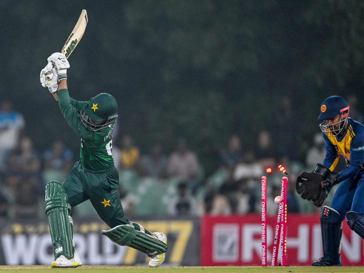 Pakistan's Saim Ayub (L) is clean bowled by Sri Lanka's Maheesh Theekshana during the first Twenty20 international cricket match between Sri Lanka and Pakistan at the Rangiri Dambulla International Stadium in Dambulla on January 7, 2026. Photo: AFP