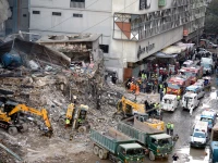 rescue workers and heavy machinery continue debris removal at gul plaza on m a jinnah road following a devastating fire as authorities fear the death toll may rise further photo ppirescue workers and heavy machinery continue debris removal at gul plaza on m a jinnah road following a devastating fire as authorities fear the death toll may rise further photo ppi