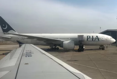 pakistan international airlines pia passenger plane sits on tarmac as seen through a plane window at the islamabad international airport islamabad pakistan october 27 2024 photo reuters file