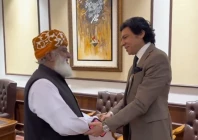 senator faisal vawda shakes hands with jamiat ulema i islam jui f chief maulana fazl ur rehman after a meeting at the latter s residence in islamabad on wednesday screengrab