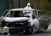a french gendarme inspects the burnt car used by a driver who rammed into pedestrians and cyclists near saint pierre d oleron on the touristic french island of ile d oleron off the atlantic coast france november 5 2025 photo reuters