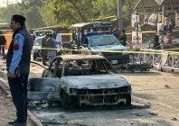 policemen examine damaged vehicles after a suicide blast outside the district court in islamabad on november 11 2025 photo afp policemen examine damaged vehicles after a suicide blast outside the district court in islamabad on november 11 2025 photo afp