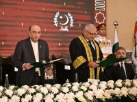 president asif ali zardari administers the oath to justice aminuddin khan as chief justice of the federal constitutional court during a ceremony at aiwan i sadr on friday photo app