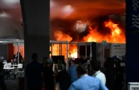 a fire burns in a pavilion during the cop30 un climate change conference in belem para state brazil on november 20 2025 a fire erupted at a pavilion inside the venue of the un s climate talks in brazil on thursday prompting panicked delegates to run for the exits afp journalists said emergency crews rushed to try to put out the blaze as smoke engulfed the corridor photo afp