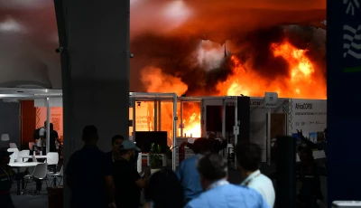 a fire burns in a pavilion during the cop30 un climate change conference in belem para state brazil on november 20 2025 a fire erupted at a pavilion inside the venue of the un s climate talks in brazil on thursday prompting panicked delegates to run for the exits afp journalists said emergency crews rushed to try to put out the blaze as smoke engulfed the corridor photo afp