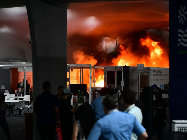 a fire burns in a pavilion during the cop30 un climate change conference in belem para state brazil on november 20 2025 a fire erupted at a pavilion inside the venue of the un s climate talks in brazil on thursday prompting panicked delegates to run for the exits afp journalists said emergency crews rushed to try to put out the blaze as smoke engulfed the corridor photo afp a fire burns in a pavilion during the cop30 un climate change conference in belem para state brazil on november 20 2025 a fire erupted at a pavilion inside the venue of the un s climate talks in brazil on thursday prompting panicked delegates to run for the exits afp journalists said emergency crews rushed to try to put out the blaze as smoke engulfed the corridor photo afp