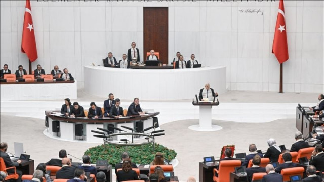 a general view shows palestinian president mahmoud abbas wearing turkish flag and palestinian flag embroidered scarf making a speech during the extraordinary meeting on palestine at the grand national assembly of turkiye in ankara turkiye on august 15 2024 photo anadolu a general view shows palestinian president mahmoud abbas wearing turkish flag and palestinian flag embroidered scarf making a speech during the extraordinary meeting on palestine at the grand national assembly of turkiye in ankara turkiye on august 15 2024 photo anadolu