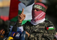 abu ubaida the spokesman of the izz el deen al qassam brigades gestures as he speaks during an anti israel military show in the southern gaza strip november 11 2019 photo reuters