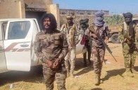 this handout picture released by the sudanese rapid support forces rsf on october 30 2025 shows rsf members reportedly detaining a fighter known as abu lulu l in el fasher in war torn sudan s western darfur region    rapid support forces rsf afp