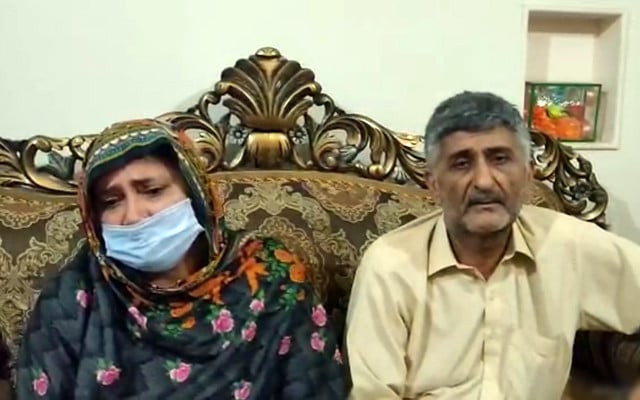 the parents of dr abuzar muhammad afzal pleading for the release of their son in a video screengrab the parents of dr abuzar muhammad afzal pleading for the release of their son in a video screengrab