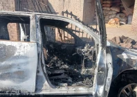 the burnt out wreckage of assistant commissioner shah wali s vehicle on miranshah road on tuesday photo express