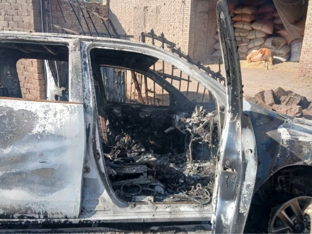the burnt out wreckage of assistant commissioner shah wali s vehicle on miranshah road on tuesday photo express
