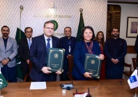 secretary economic affairs division muhammad humair karim and asian development bank country director emma fan display signed documents following an agreement ceremony between pakistan and adb on december 25 photo pid