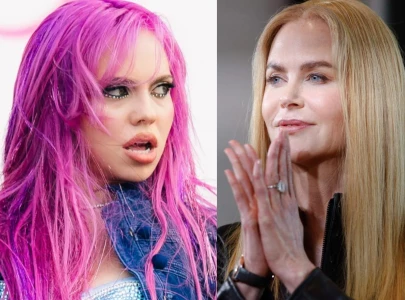 pedro pascal dua lipa kristen wiig and nicole kidman lip sync to ad la s nicole kidman at chanel
