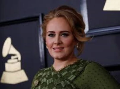 adele pauses munich concert to watch women s 100m final at 2024 olympics