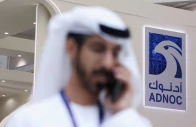a logo of adnoc is displayed at the make it in the emirates miite conference in abu dhabi united arab emirates may 4 2026 photo reuters