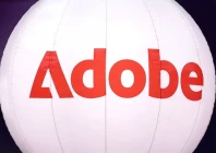 a logo of computer software company adobe is seen during the adopt ai international summit at the grand palais in paris france november 26 2025 reuters