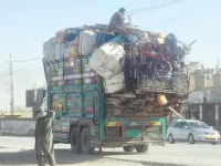 a truck loaded with goods of afghan refugees passes through the western bypass in quetta thousands of afghans return to their country as pakistan intensifies drive to deport all unregistered refugees photo ppi