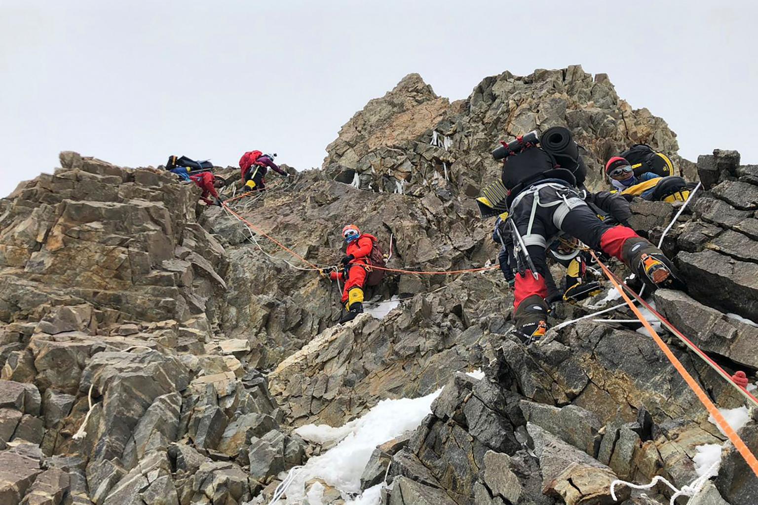 nepali mountaineers on their way to the summit of k2 photo afp