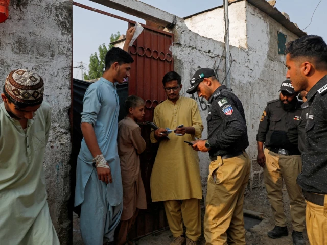 police officers along with workers from the national database and registration authority nadra check the identity cards of afghan citizens during a door to door search and verification drive for undocumented afghan nationals in an afghan camp on the outskirts of karachi pakistan november 21 2023 photo reuters file police officers along with workers from the national database and registration authority nadra check the identity cards of afghan citizens during a door to door search and verification drive for undocumented afghan nationals in an afghan camp on the outskirts of karachi pakistan november 21 2023 photo reuters file