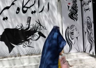 an afghan woman walks past a beauty salon in kabul afghanistan july 6 2023 file photo reuters