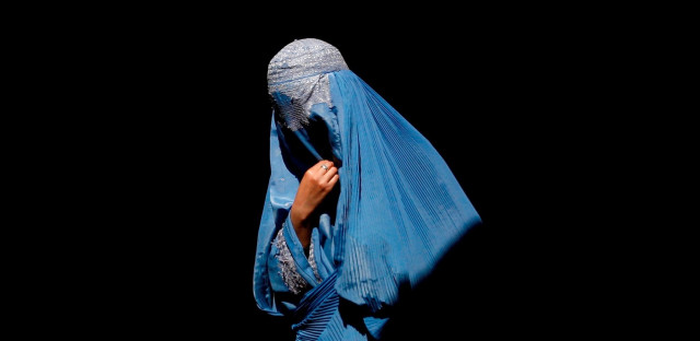 women in afghanistan living under loaded guns