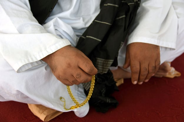 In this photograph taken on March 22, 2017, former Afghan Taliban commander Maulvi Abdul Rauf, 37, holds prayer beads during an interview with AFP in the Panjwayi district of Kandahar Province. PHOTO: AFP