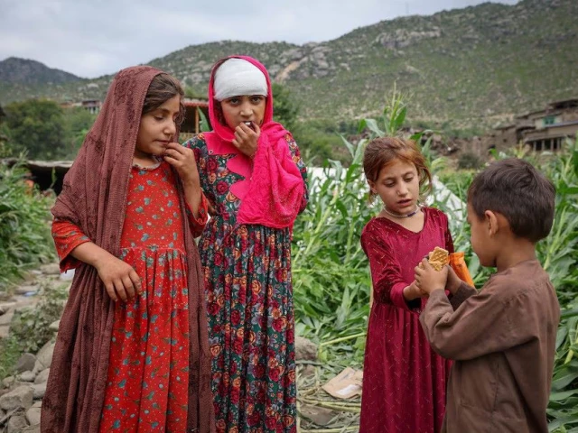 an injured afghan girl stands with others after getting first aid following a deadly magnitude 6 earthquake that struck afghanistan on sunday in mazar dara kunar province afghanistan september 2 2025 photo reuters an injured afghan girl stands with others after getting first aid following a deadly magnitude 6 earthquake that struck afghanistan on sunday in mazar dara kunar province afghanistan september 2 2025 photo reuters