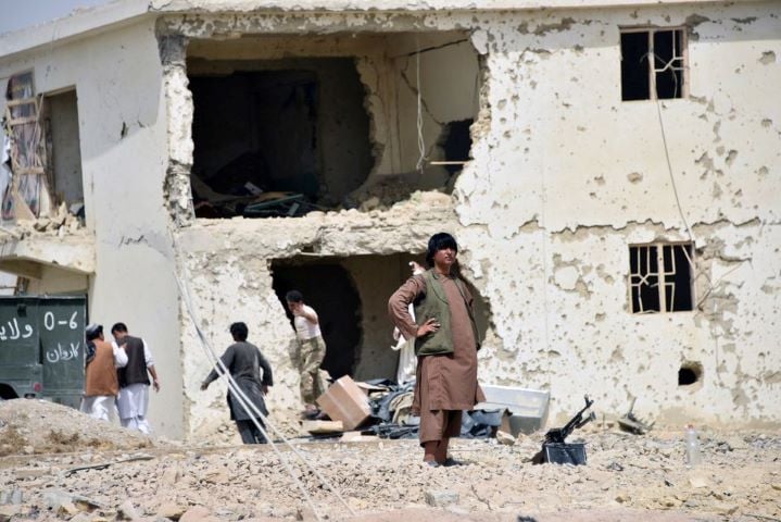 afghan men inspect the site of a car bomb attack in kandahar province afghanistan july 6 2021 reuters stringer no resales no archives