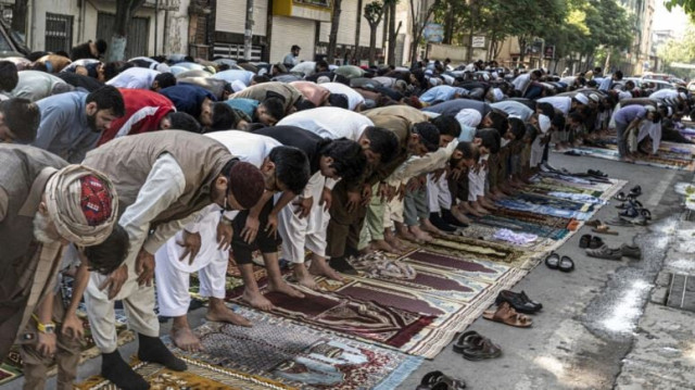 muslim devotees offering eidul fitr prayers which marks the end of the holy fasting month of ramazan outside a mosque in kabul earlier this year photo afp file muslim devotees offering eidul fitr prayers which marks the end of the holy fasting month of ramazan outside a mosque in kabul earlier this year photo afp file
