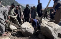 a massive flood brought huge boulders that smashed into buildings in afghanistan s parun photo afp