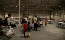 afghan government urges its citizens stranded in qatar while awaiting us visas to return home