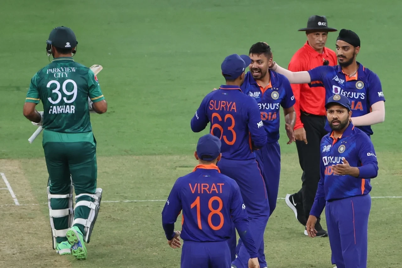 avesh khan celebrates with teammates after dismissing fakhar zaman during the asia cup 2022 photo afp