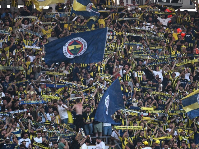 fenerbahce fans cheer for their team during the uefa champions league 3rd round second leg football match against feyenoord in istanbul on august 12 2025 photo afp fenerbahce fans cheer for their team during the uefa champions league 3rd round second leg football match against feyenoord in istanbul on august 12 2025 photo afp