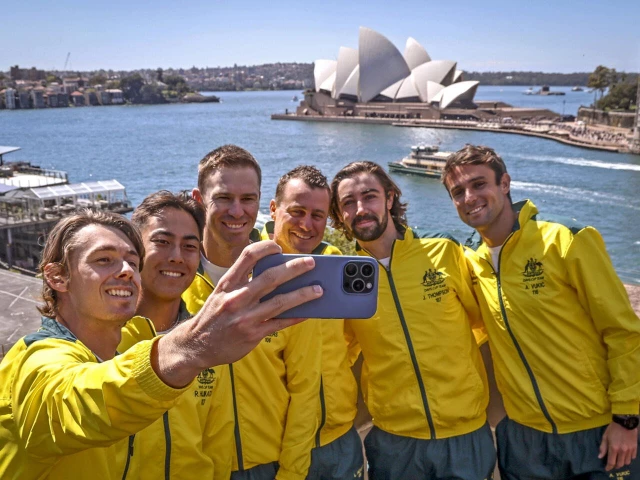 australia s alex de minaur l takes a selfie with his davis cup teammates in front of the sydney opera house photo afp